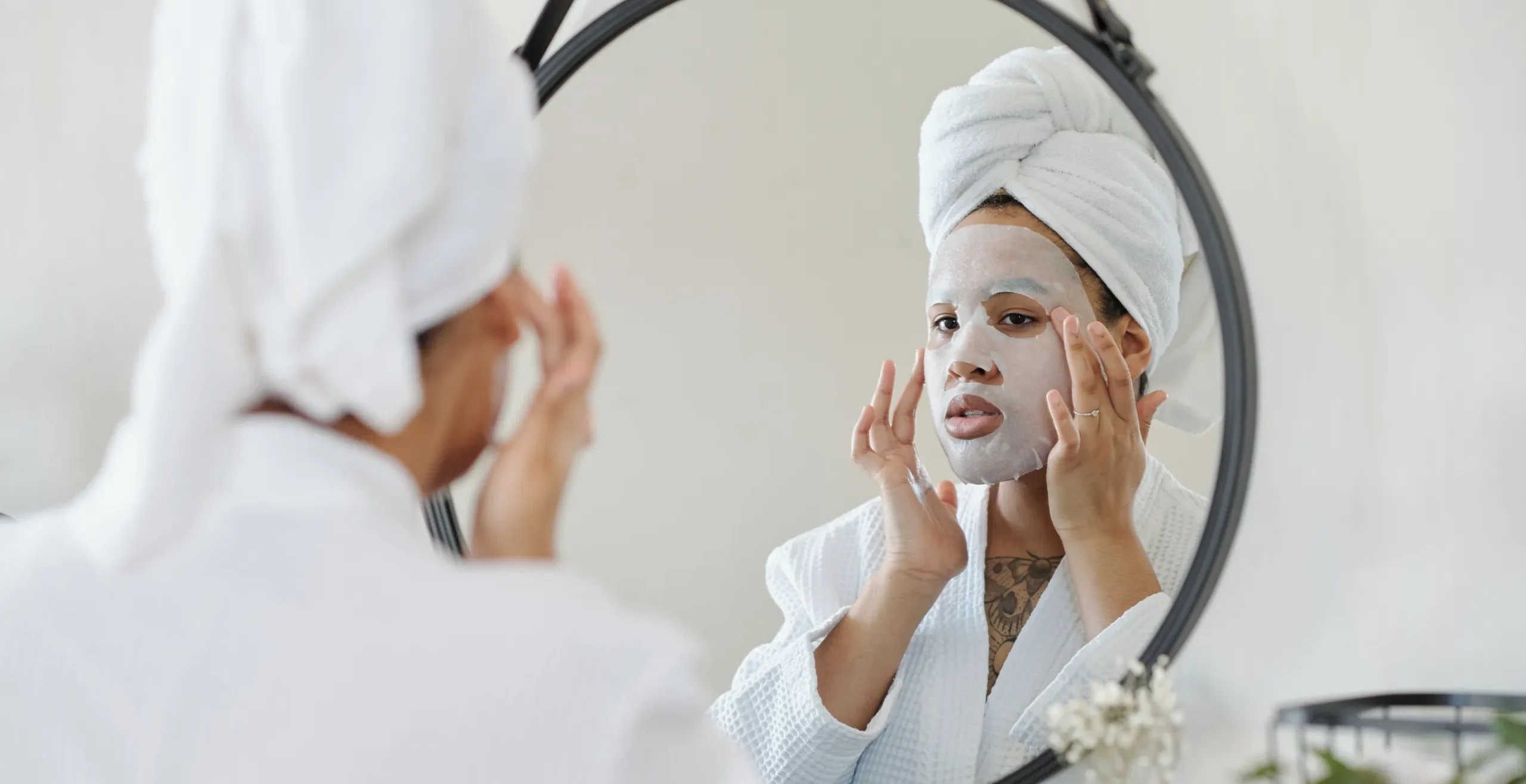 applying face sheet mask - skin routines