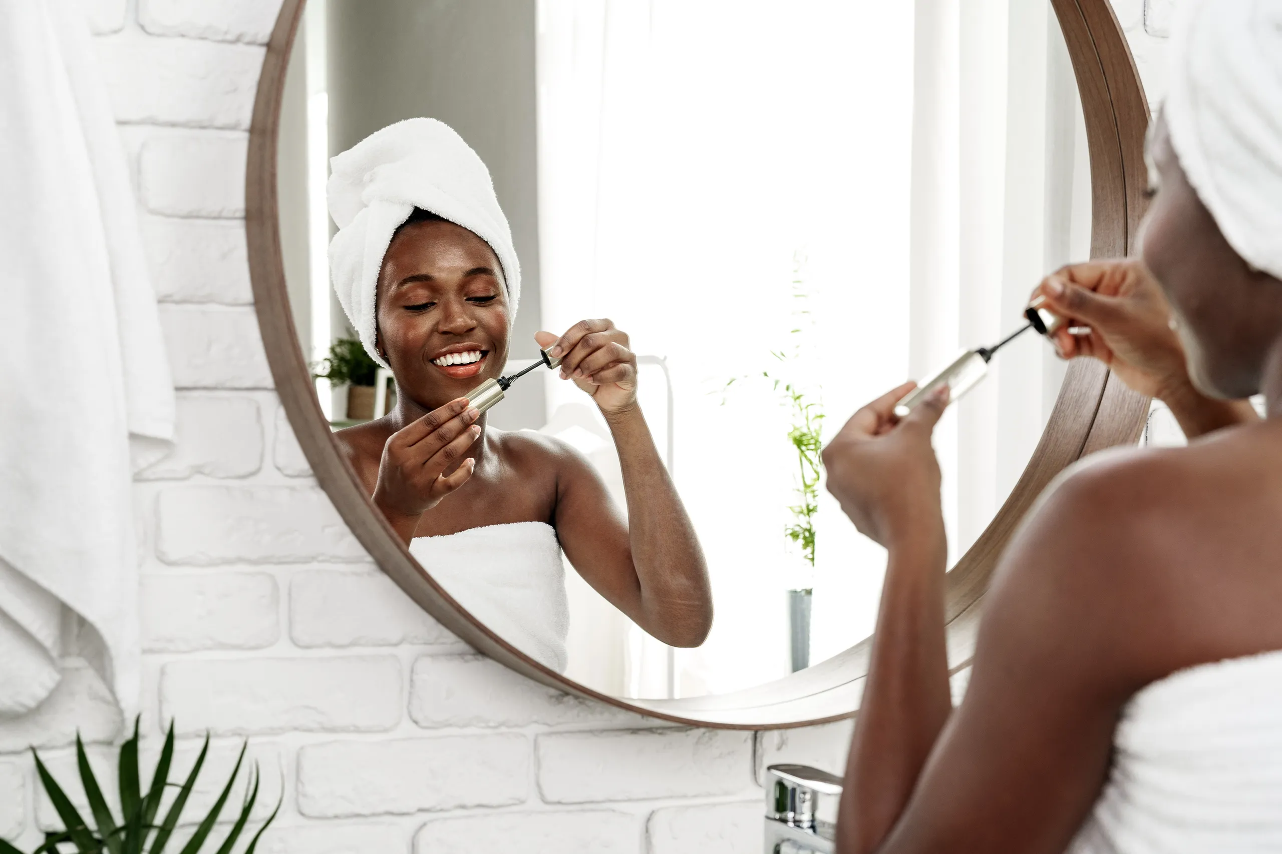 Applying makeup after skincare routine