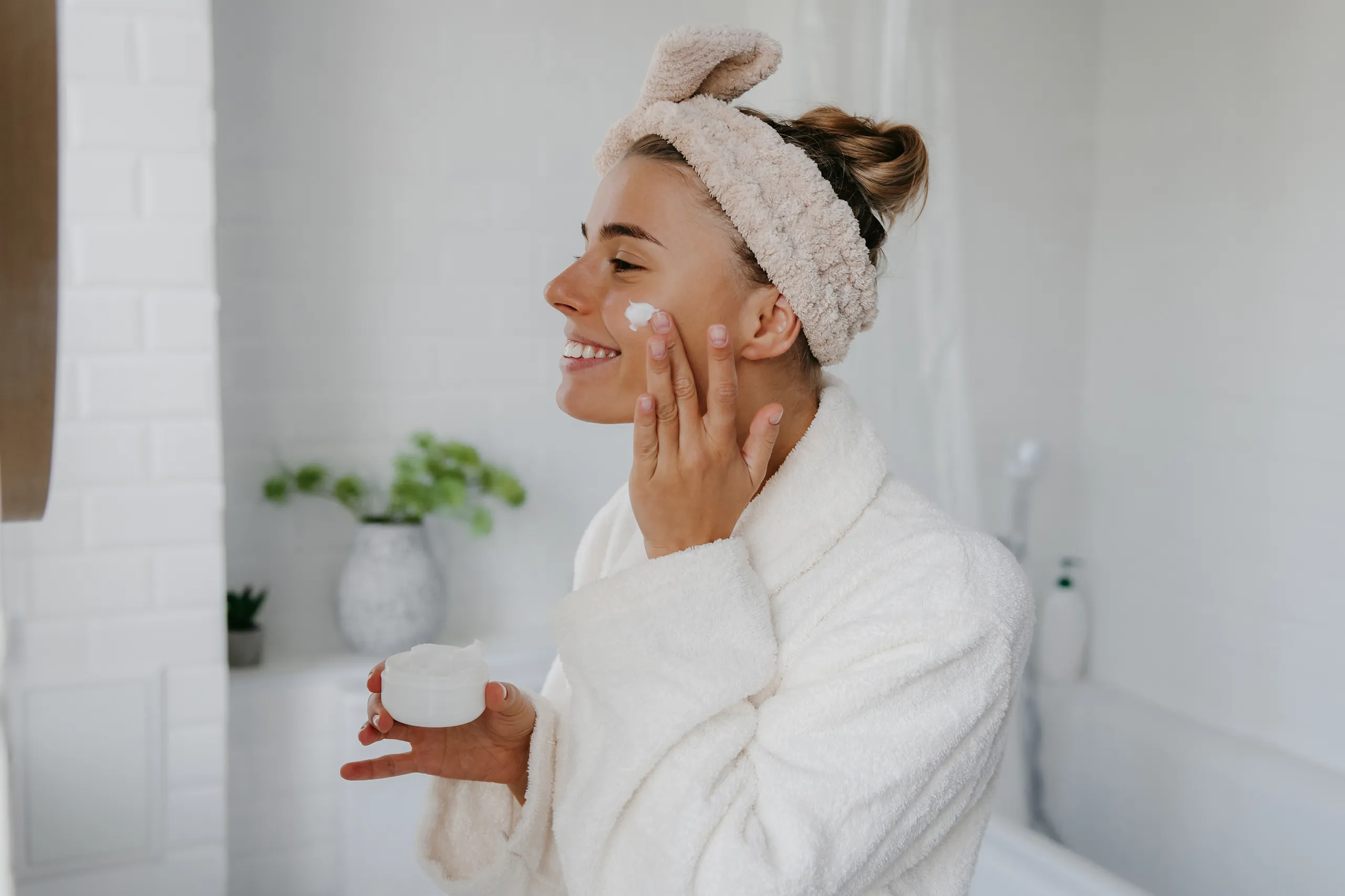 Applying moisturiser after using sheet mask