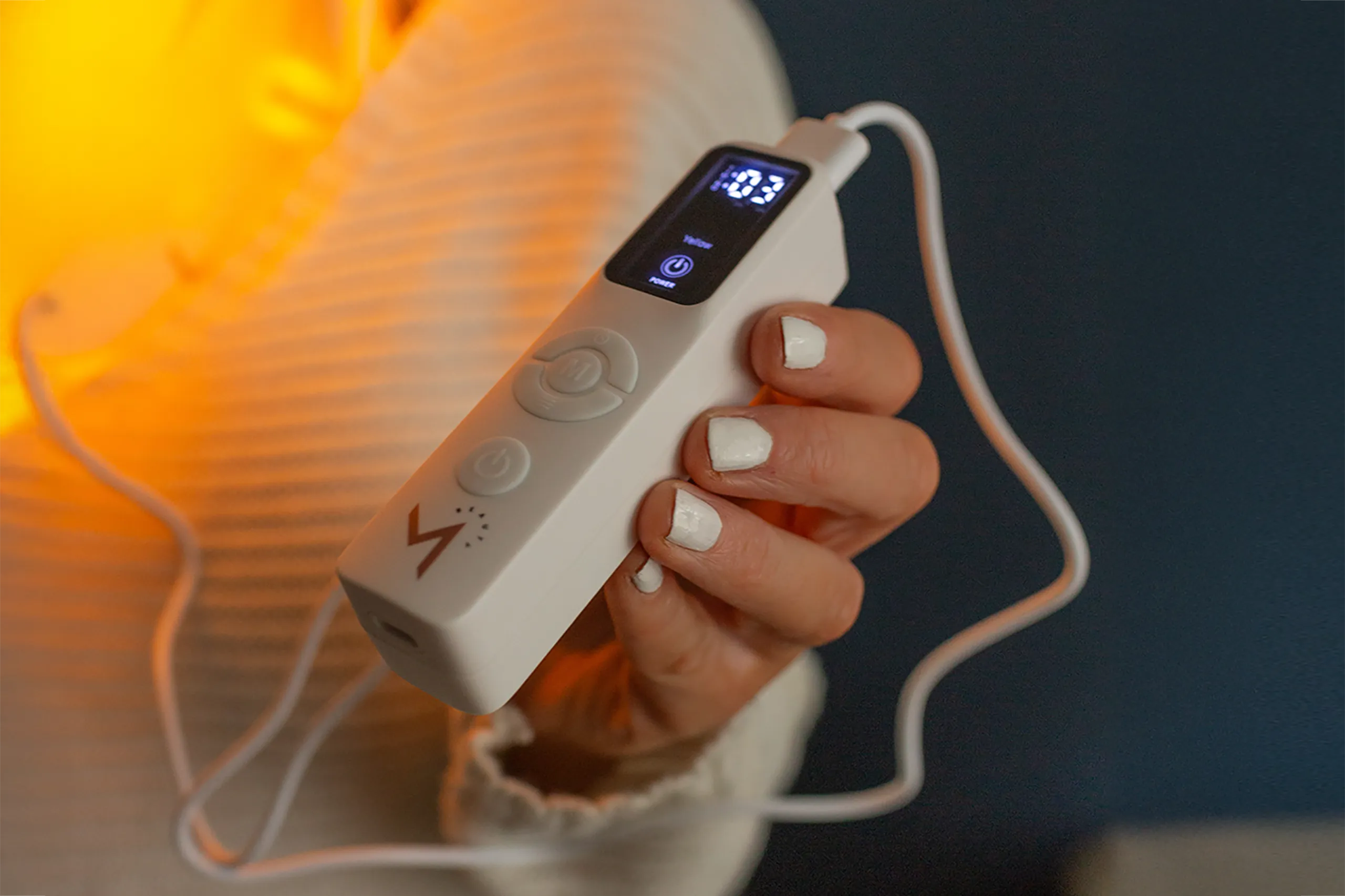 Choosing a setting for LED therapy mask